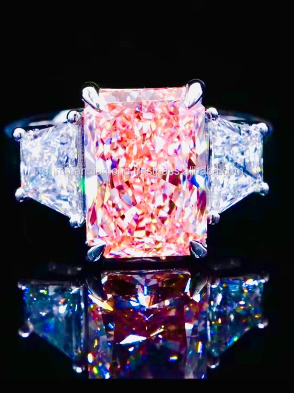 A exquisite, vivid, pink, 7 carat, modified radiant,  
Cut Diamond